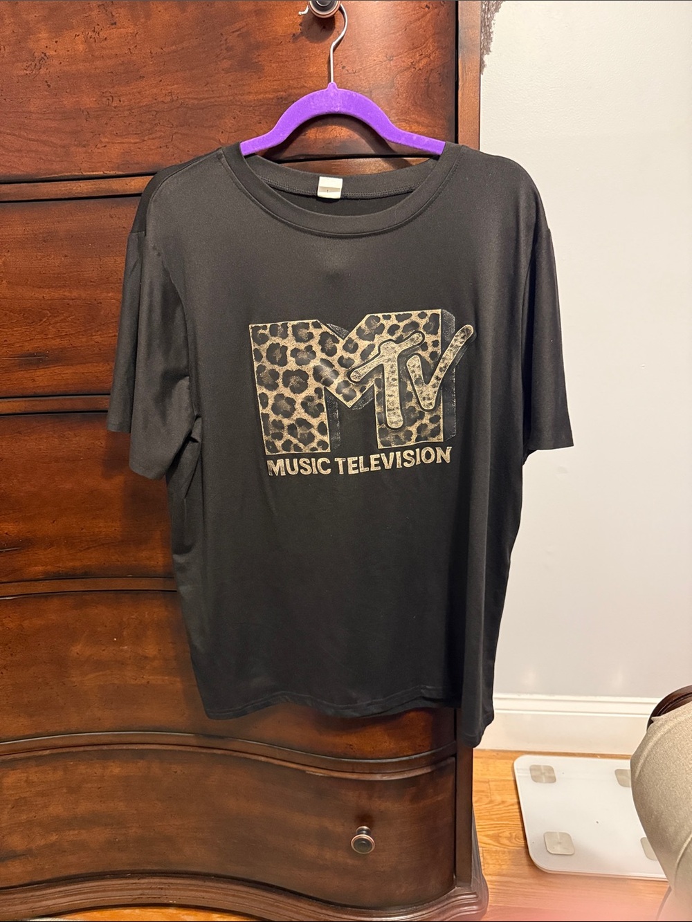 MTV Black Tee with Leopard Logo and Gold Text